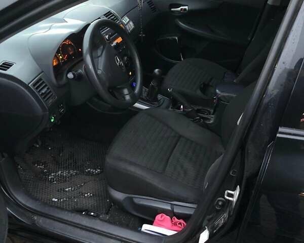 Чорний Тойота Королла, об'ємом двигуна 1.6 л та пробігом 305 тис. км за 6300 $, фото 5 на Automoto.ua