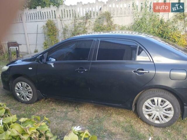 Черный Тойота Королла, объемом двигателя 1.6 л и пробегом 255 тыс. км за 6800 $, фото 5 на Automoto.ua
