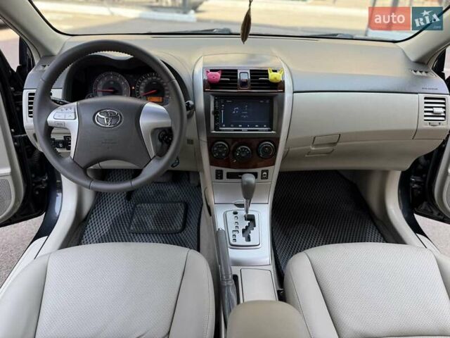 Черный Тойота Королла, объемом двигателя 1.8 л и пробегом 289 тыс. км за 7599 $, фото 21 на Automoto.ua