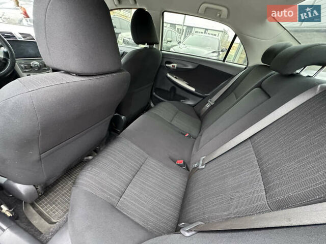 Черный Тойота Королла, объемом двигателя 1.6 л и пробегом 221 тыс. км за 6999 $, фото 8 на Automoto.ua