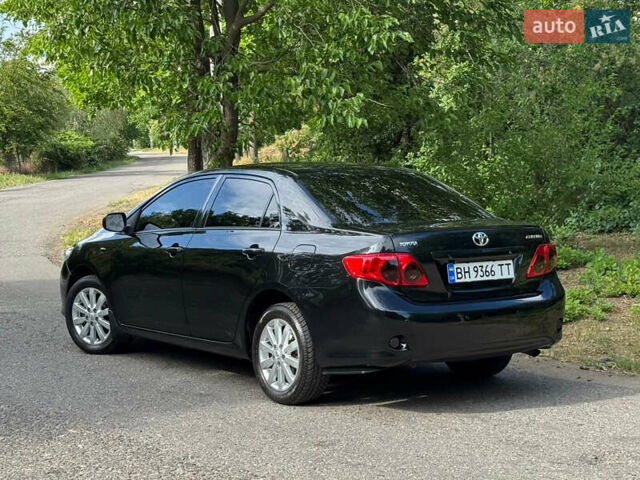 Черный Тойота Королла, объемом двигателя 1.6 л и пробегом 191 тыс. км за 7999 $, фото 3 на Automoto.ua