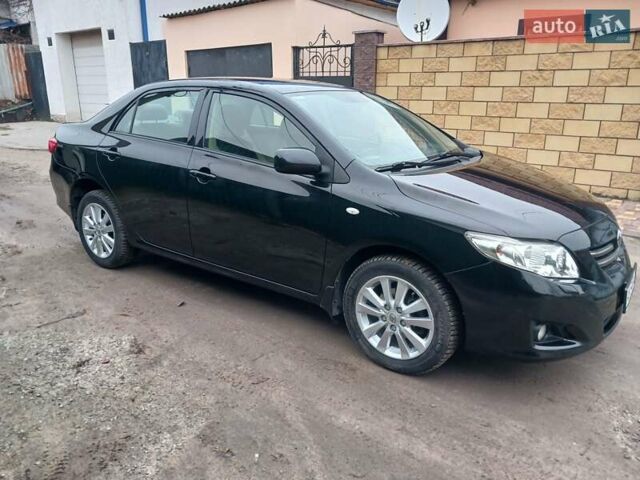 Чорний Тойота Королла, об'ємом двигуна 1.6 л та пробігом 132 тис. км за 7985 $, фото 18 на Automoto.ua