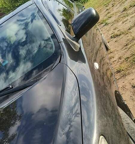 Черный Тойота Королла, объемом двигателя 1.6 л и пробегом 215 тыс. км за 6200 $, фото 5 на Automoto.ua