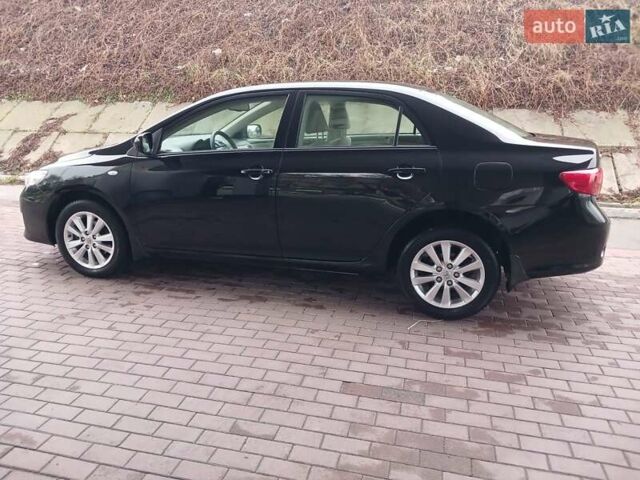 Чорний Тойота Королла, об'ємом двигуна 1.6 л та пробігом 132 тис. км за 7985 $, фото 3 на Automoto.ua