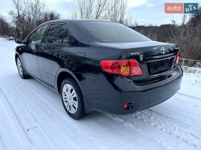 Чорний Тойота Королла, об'ємом двигуна 1.6 л та пробігом 162 тис. км за 7200 $, фото 12 на Automoto.ua