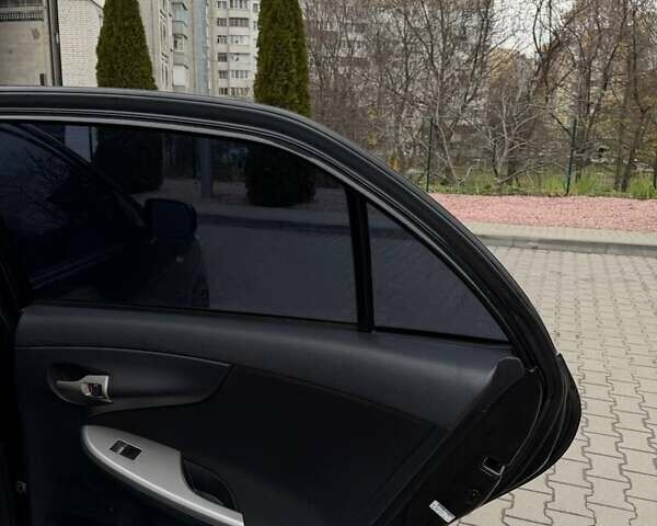 Черный Тойота Королла, объемом двигателя 1.6 л и пробегом 180 тыс. км за 5999 $, фото 21 на Automoto.ua