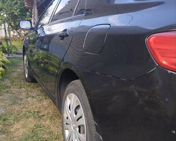 Черный Тойота Королла, объемом двигателя 1.6 л и пробегом 255 тыс. км за 6800 $, фото 6 на Automoto.ua