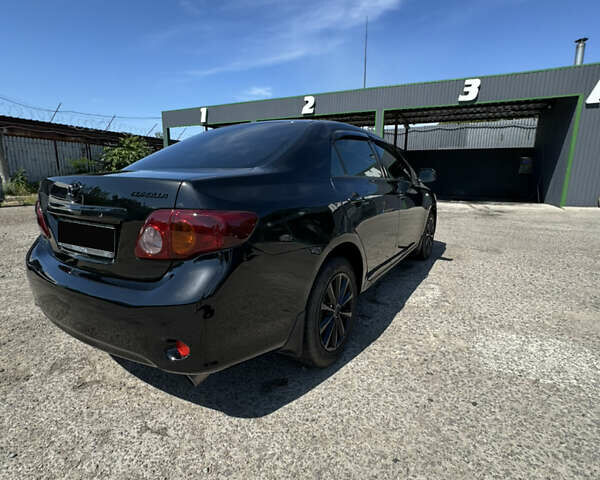 Чорний Тойота Королла, об'ємом двигуна 1.6 л та пробігом 201 тис. км за 7000 $, фото 4 на Automoto.ua