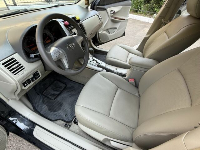 Чорний Тойота Королла, об'ємом двигуна 1.8 л та пробігом 191 тис. км за 7599 $, фото 15 на Automoto.ua