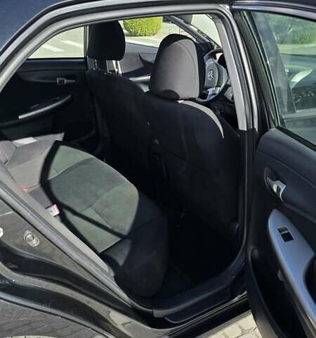 Черный Тойота Королла, объемом двигателя 1.6 л и пробегом 244 тыс. км за 6950 $, фото 16 на Automoto.ua