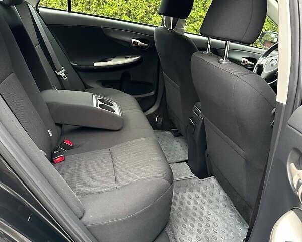 Чорний Тойота Королла, об'ємом двигуна 1.6 л та пробігом 49 тис. км за 9999 $, фото 28 на Automoto.ua