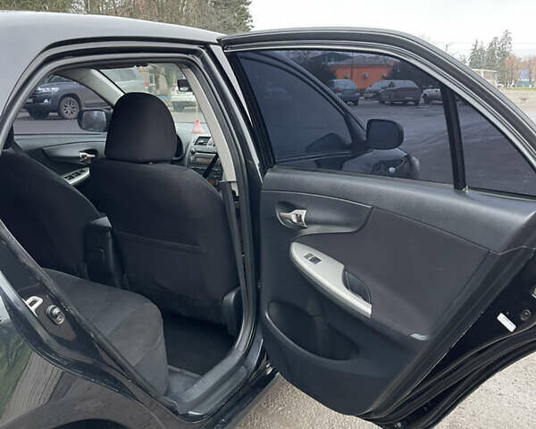 Чорний Тойота Королла, об'ємом двигуна 1.6 л та пробігом 208 тис. км за 7200 $, фото 17 на Automoto.ua