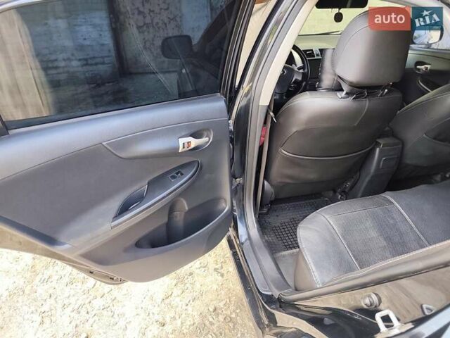 Черный Тойота Королла, объемом двигателя 1.6 л и пробегом 290 тыс. км за 7500 $, фото 13 на Automoto.ua