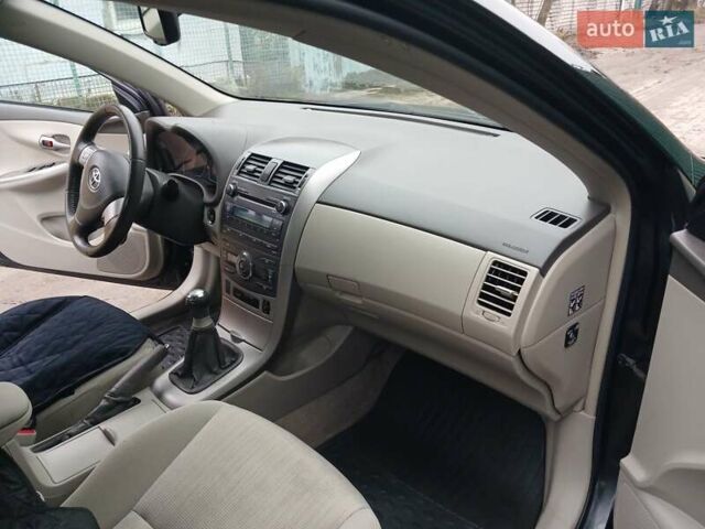 Чорний Тойота Королла, об'ємом двигуна 1.6 л та пробігом 132 тис. км за 7985 $, фото 20 на Automoto.ua