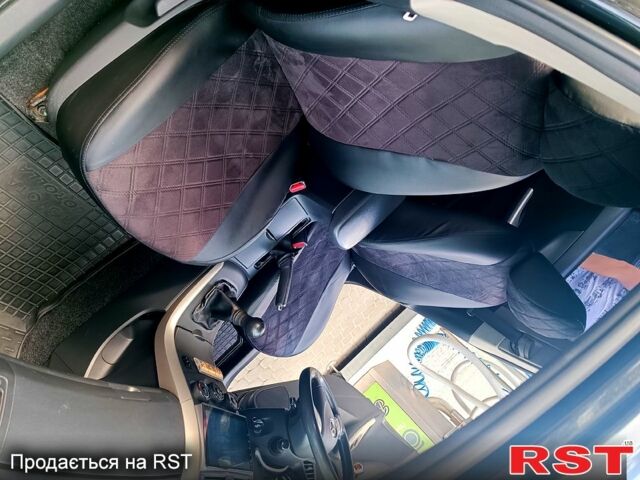 Чорний Тойота Королла, об'ємом двигуна 1.6 л та пробігом 279 тис. км за 7000 $, фото 3 на Automoto.ua