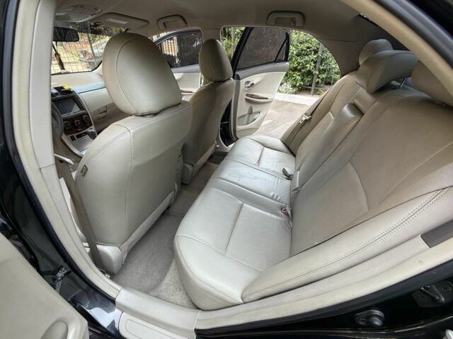 Чорний Тойота Королла, об'ємом двигуна 1.8 л та пробігом 191 тис. км за 7599 $, фото 11 на Automoto.ua