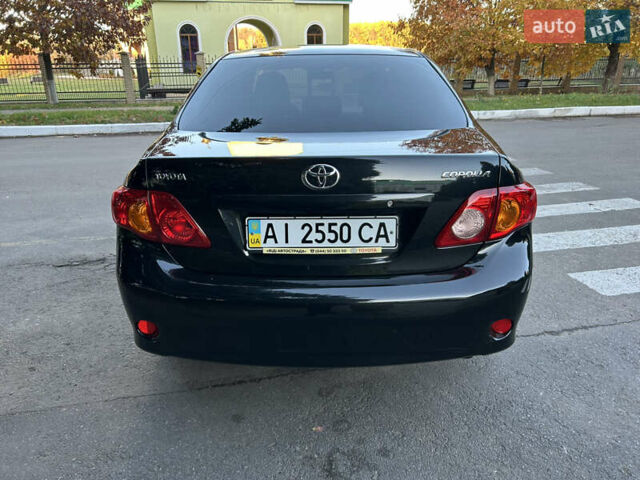 Черный Тойота Королла, объемом двигателя 1.6 л и пробегом 42 тыс. км за 10300 $, фото 12 на Automoto.ua