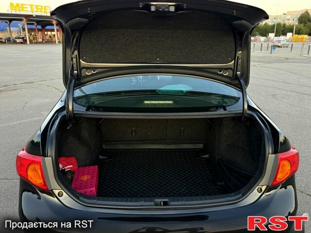 Чорний Тойота Королла, об'ємом двигуна 1.6 л та пробігом 0 тис. км за 7200 $, фото 9 на Automoto.ua