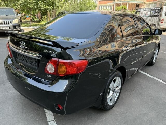 Чорний Тойота Королла, об'ємом двигуна 1.8 л та пробігом 191 тис. км за 7599 $, фото 5 на Automoto.ua