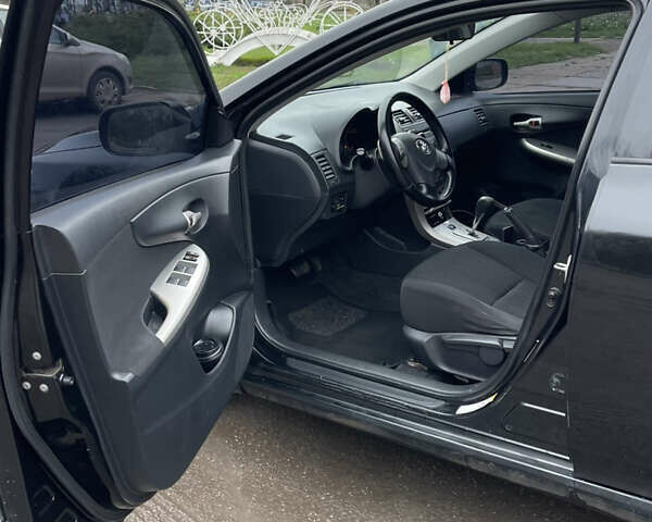 Чорний Тойота Королла, об'ємом двигуна 1.6 л та пробігом 208 тис. км за 7200 $, фото 13 на Automoto.ua