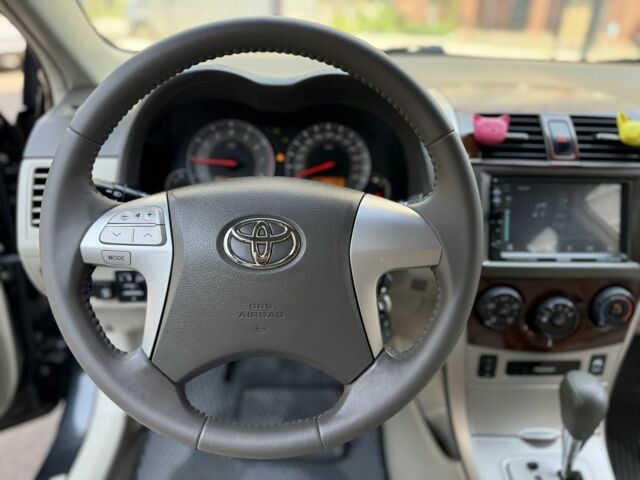 Чорний Тойота Королла, об'ємом двигуна 1.8 л та пробігом 191 тис. км за 7599 $, фото 13 на Automoto.ua