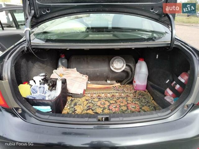 Черный Тойота Королла, объемом двигателя 1.6 л и пробегом 226 тыс. км за 6000 $, фото 9 на Automoto.ua