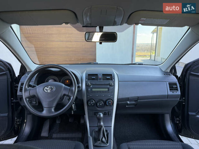 Черный Тойота Королла, объемом двигателя 1.6 л и пробегом 147 тыс. км за 6999 $, фото 52 на Automoto.ua