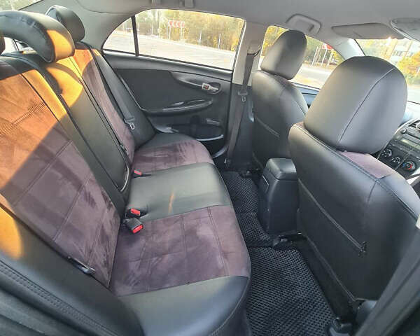 Чорний Тойота Королла, об'ємом двигуна 1.6 л та пробігом 200 тис. км за 7500 $, фото 7 на Automoto.ua