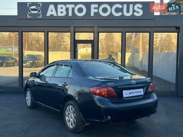 Черный Тойота Королла, объемом двигателя 1.6 л и пробегом 186 тыс. км за 7490 $, фото 4 на Automoto.ua