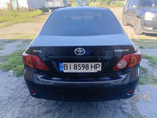 Чорний Тойота Королла, об'ємом двигуна 1.6 л та пробігом 226 тис. км за 6600 $, фото 3 на Automoto.ua