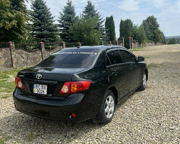 Чорний Тойота Королла, об'ємом двигуна 1.8 л та пробігом 38 тис. км за 7100 $, фото 3 на Automoto.ua