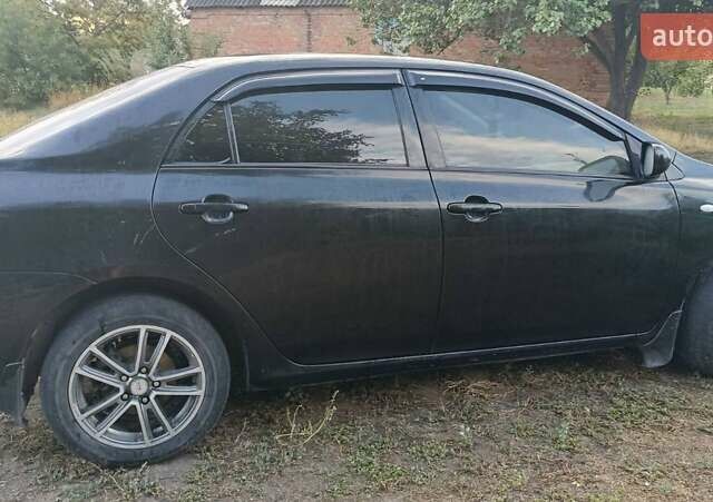 Черный Тойота Королла, объемом двигателя 1.6 л и пробегом 215 тыс. км за 6200 $, фото 7 на Automoto.ua