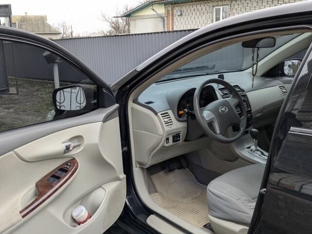 Черный Тойота Королла, объемом двигателя 1.6 л и пробегом 210 тыс. км за 7999 $, фото 4 на Automoto.ua