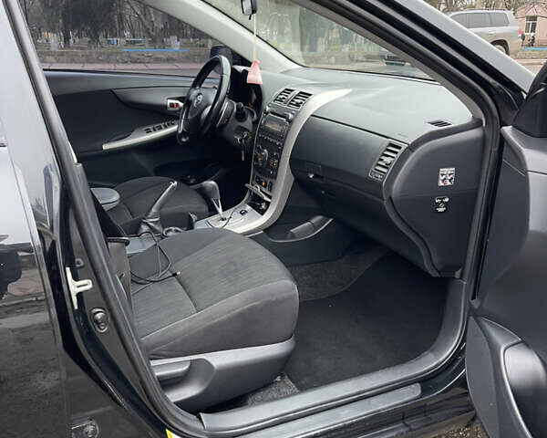 Чорний Тойота Королла, об'ємом двигуна 1.6 л та пробігом 208 тис. км за 7200 $, фото 18 на Automoto.ua