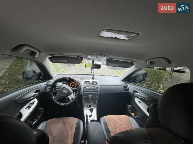 Чорний Тойота Королла, об'ємом двигуна 1.6 л та пробігом 147 тис. км за 7700 $, фото 9 на Automoto.ua