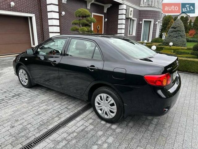 Чорний Тойота Королла, об'ємом двигуна 1.6 л та пробігом 49 тис. км за 9999 $, фото 6 на Automoto.ua