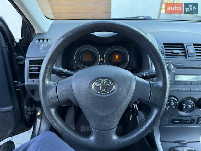 Черный Тойота Королла, объемом двигателя 1.6 л и пробегом 147 тыс. км за 6999 $, фото 53 на Automoto.ua