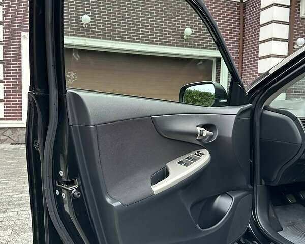 Чорний Тойота Королла, об'ємом двигуна 1.6 л та пробігом 49 тис. км за 9999 $, фото 14 на Automoto.ua