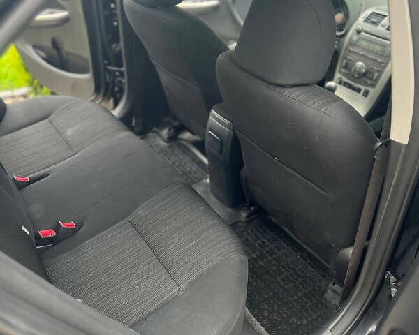 Черный Тойота Королла, объемом двигателя 1.8 л и пробегом 213 тыс. км за 7300 $, фото 11 на Automoto.ua