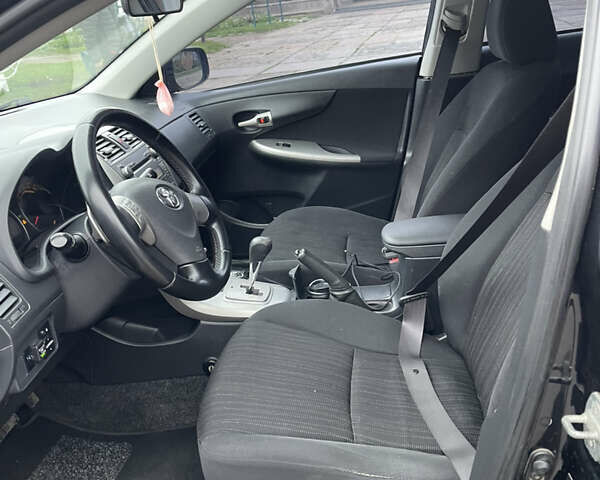 Чорний Тойота Королла, об'ємом двигуна 1.6 л та пробігом 208 тис. км за 7200 $, фото 12 на Automoto.ua