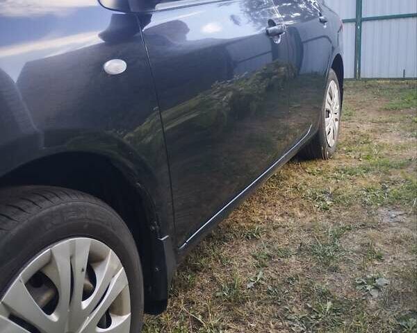Черный Тойота Королла, объемом двигателя 1.6 л и пробегом 255 тыс. км за 6800 $, фото 3 на Automoto.ua