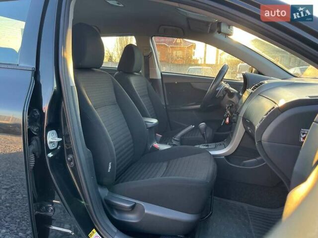 Черный Тойота Королла, объемом двигателя 1.6 л и пробегом 186 тыс. км за 7490 $, фото 10 на Automoto.ua