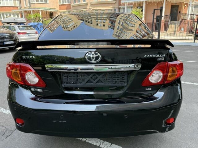 Чорний Тойота Королла, об'ємом двигуна 1.8 л та пробігом 191 тис. км за 7599 $, фото 6 на Automoto.ua