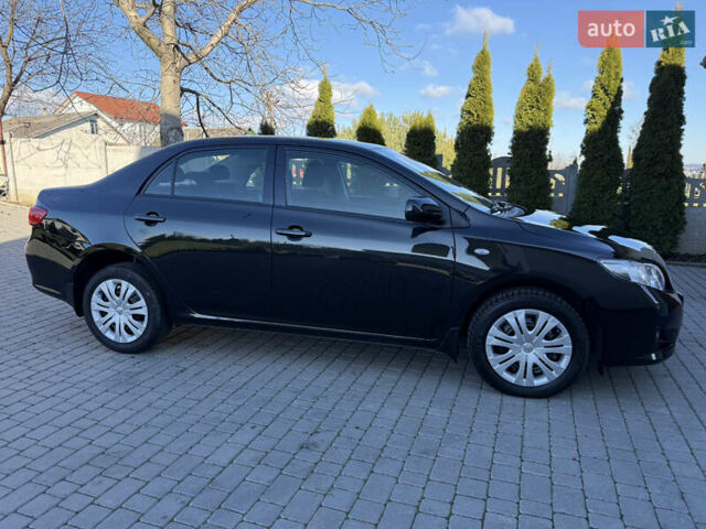 Черный Тойота Королла, объемом двигателя 1.6 л и пробегом 147 тыс. км за 6999 $, фото 17 на Automoto.ua