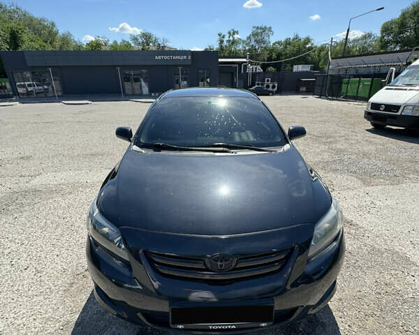 Чорний Тойота Королла, об'ємом двигуна 1.6 л та пробігом 201 тис. км за 7000 $, фото 1 на Automoto.ua