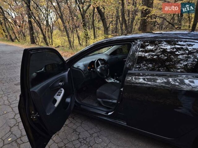 Чорний Тойота Королла, об'ємом двигуна 1.6 л та пробігом 212 тис. км за 6700 $, фото 6 на Automoto.ua