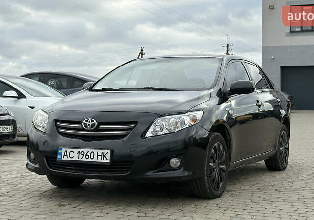 Чорний Тойота Королла, об'ємом двигуна 1.6 л та пробігом 207 тис. км за 6300 $, фото 1 на Automoto.ua