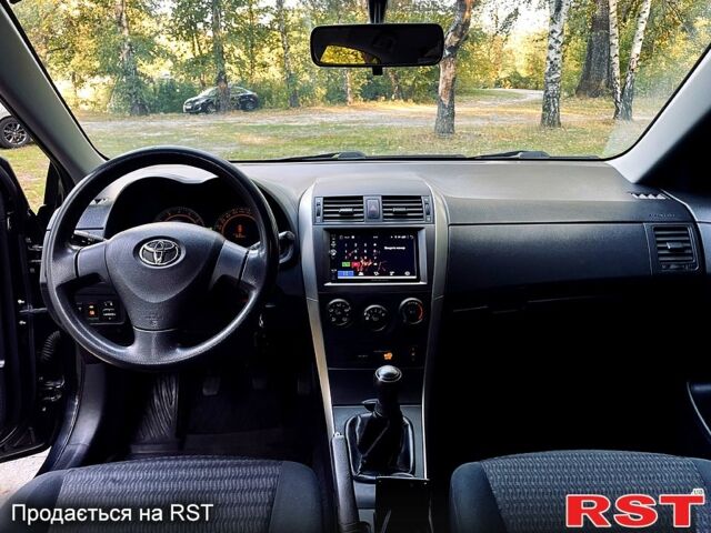Черный Тойота Королла, объемом двигателя 1.6 л и пробегом 182 тыс. км за 7990 $, фото 3 на Automoto.ua
