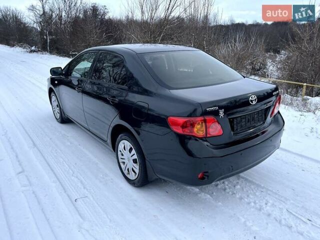Чорний Тойота Королла, об'ємом двигуна 1.6 л та пробігом 162 тис. км за 7200 $, фото 7 на Automoto.ua