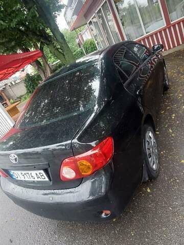 Черный Тойота Королла, объемом двигателя 1.6 л и пробегом 229 тыс. км за 6100 $, фото 2 на Automoto.ua